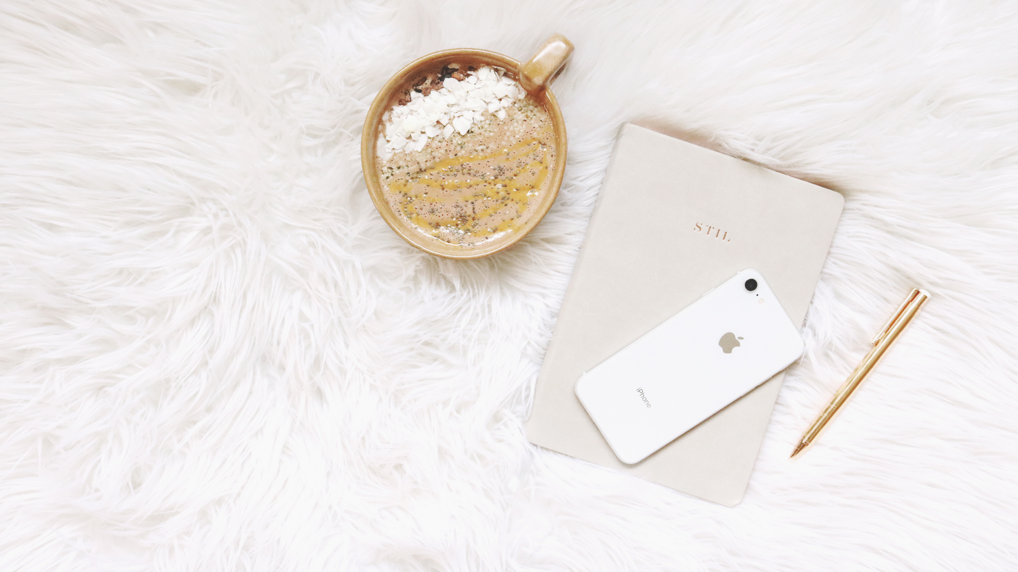 smoothie bowl on blanket with journal, iphone and gold pen - organic traditions blog post cover